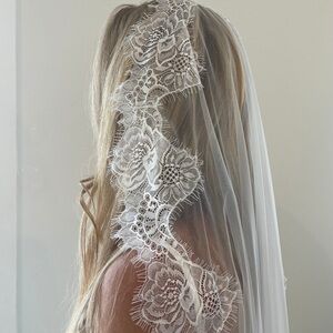 Elegant White Lace Bridal Veil by Harriett Falvey